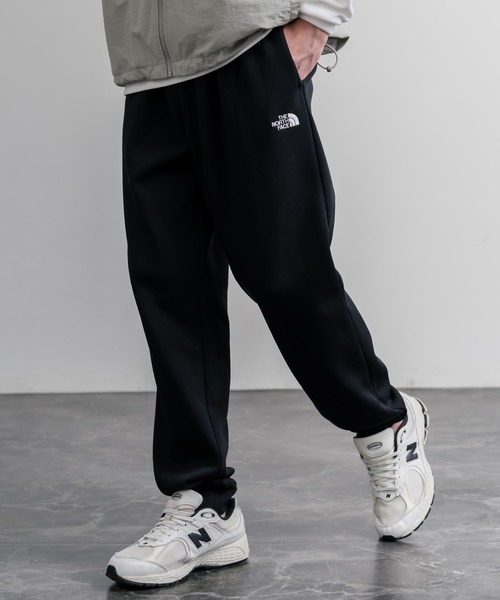 THE NORTH FACE(ザノースフェイス)の「THE NORTH FACE M EVO SD REG JOGGER ノースフェイス 裏起毛ワンポイントロゴ刺繍スウェットイージージョガーパンツ(スウェットパンツ・メンズ・ヘザーグレー/ブラック・M/L)」の1枚目の写真