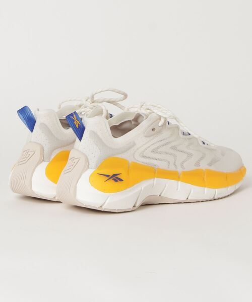 Reebok(リーボック)の「ジグ キネティカ II / Zig Kinetica II Shoes(スニーカー・メンズ・ベージュ系その他/グレー系その他/ブラック×レッド・26.5cm/28.0cm/23.5cm/25.0cm/28.5cm/25.5cm/27.0cm/24.5cm/26.0cm/22.5cm/24.0cm/27.5cm/29.0cm/23.0cm)」の10枚目の写真