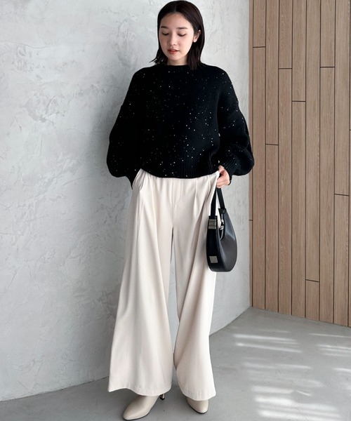 Doux archives（ドゥアルシーヴ）の「スパンコールショートニットプル