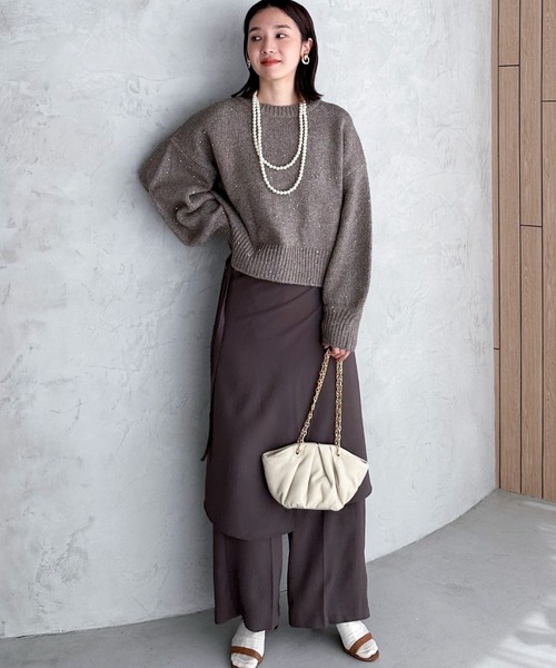 Doux archives（ドゥアルシーヴ）の「スパンコールショートニットプル