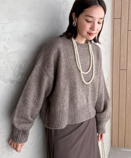 Doux archives（ドゥアルシーヴ）の「スパンコールショートニットプル