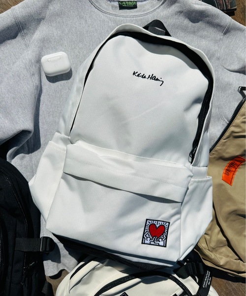 Keith Haring(キース・ヘリング)の「Keith Haring/ / ディパックL / 15606(バックパック/リュック・レディース・ホワイト/ブラック・ONESIZE)」の1枚目の写真