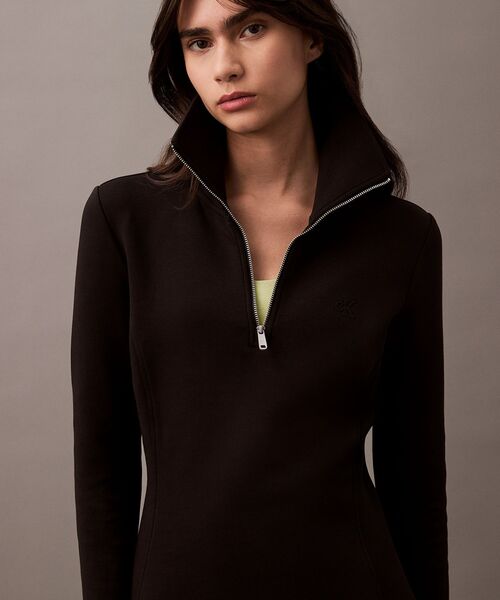 Calvin Klein(カルバン・クライン)の「フィットアンドフレア ハーフジップ ミニワンピース(ワンピース・レディース・ブラック・XS/XXS)」の1枚目の写真
