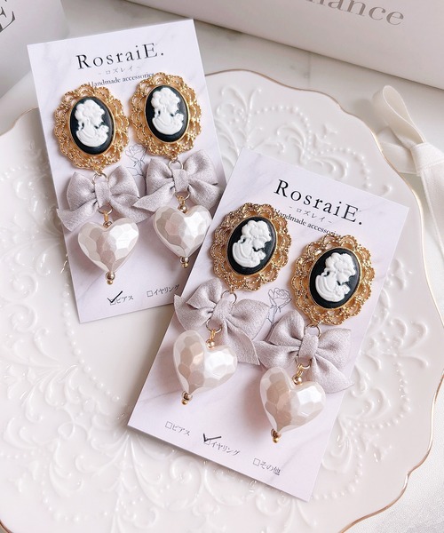 tone(トーン)の「【RosraiE】レディカメオ リボンハート ロング イヤリング(MA)(イヤリング・レディース・ゴールド・FREE)」の1枚目の写真