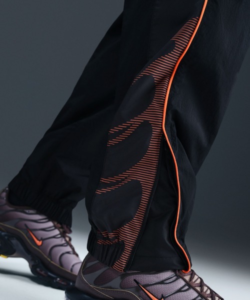 NIKE(ナイキ)の「NIKE M NSW TN PANT WOVEN / ナイキ NSW TN ウーヴン パンツ 【SP】(その他パンツ・メンズ・ブラック・M/S/XXL/XL/L)」の6枚目の写真