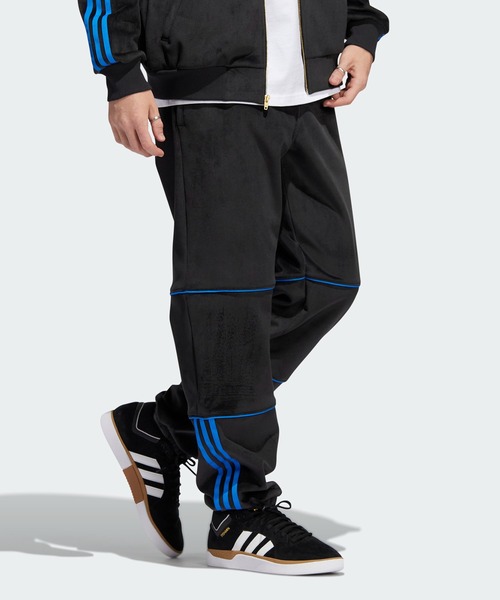 adidas（アディダス）の「タイショーン ベロア トラックパンツ