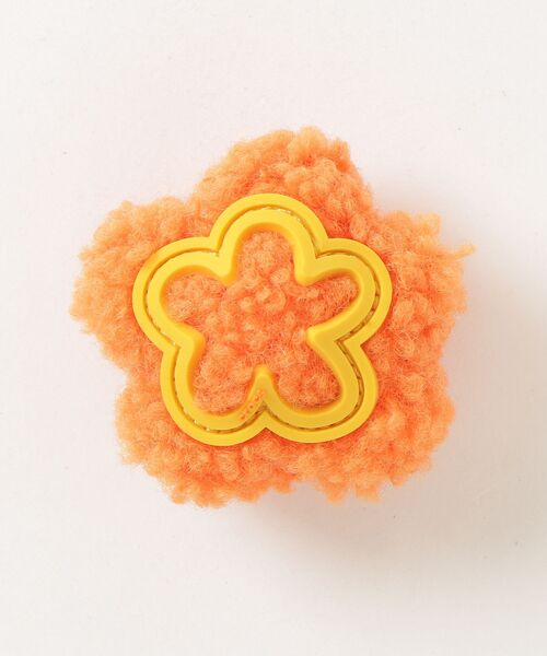 crocs(クロックス)の「crocs Plush Orange Daisy / クロックス プラッシュオレンジデイジー(シューズアクセサリー・レディース・マルチ・FREE)」の1枚目の写真
