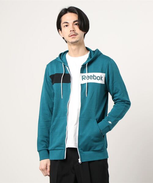 Reebok(リーボック)の「トレーニング エッセンシャルズ リニア ロゴ フーディー / Training Essentials Linear Logo Hoodie(パーカー・メンズ・ターコイズブルー/ブラック・SMALL/MEDIUM/LARGE/X-LARGE/XX-LARGE/X-SMALL/XXX-LARGE)」の8枚目の写真