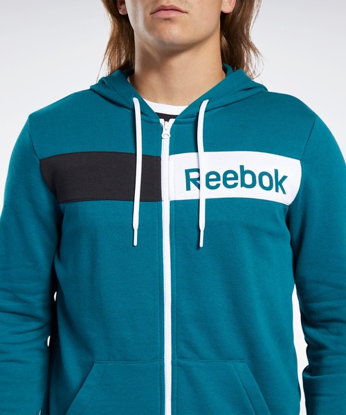 Reebok(リーボック)の「トレーニング エッセンシャルズ リニア ロゴ フーディー / Training Essentials Linear Logo Hoodie(パーカー・メンズ・ターコイズブルー/ブラック・SMALL/MEDIUM/LARGE/X-LARGE/XX-LARGE/X-SMALL/XXX-LARGE)」の5枚目の写真