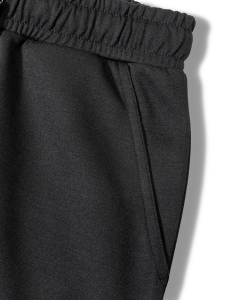 GALLIS ADDICTION(ガリスアディクション)の「GA BACK-LOGO PANTS(スウェットパンツ・メンズ・ブラック/グレー・L/M)」の6枚目の写真