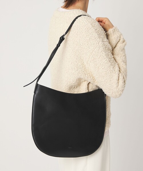 NOTHING WRITTEN(ナッシングリトゥン)の「<NOTHING WRITTEN> Flat Round Bag(ショルダーバッグ・レディース・ブラック・FREE)」の1枚目の写真