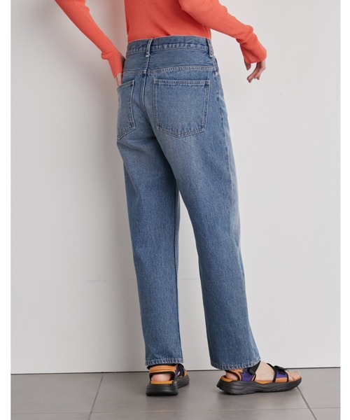 emmi デニムパンツ　新品未使用 emmi（エミ）の「【emmi atelier】カーブシルエットデニム