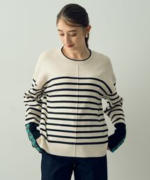 釦デザインニット