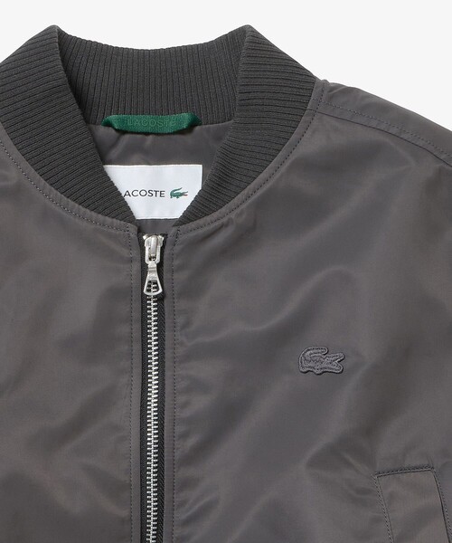 LACOSTE（ラコステ）の「クロップド丈 ショートMA-1ジャケット（ブルゾン・レディース・オリーブ/グレー・38/36/34/40）」の5枚目の写真