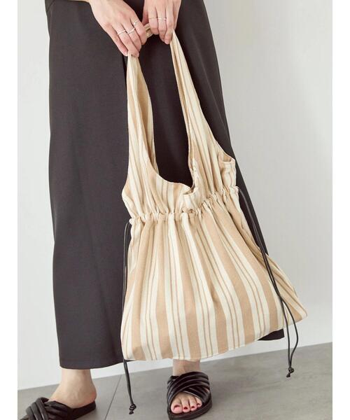 Samansa Mos2 blue(サマンサモスモスブルー)の「ストライプ巾着トートバッグ(ハンドバッグ・レディース・ネイビー/ブラック/ベージュ・F)」の1枚目の写真