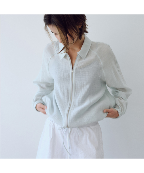 URAGO(ユラーゴ)の「Light crease string jumper(ナイロンジャケット・レディース・アイボリー/ミント・FREE)」の1枚目の写真