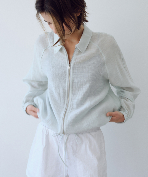 URAGO(ユラーゴ)の「Light crease string jumper(ナイロンジャケット・レディース・アイボリー/ミント・FREE)」の4枚目の写真