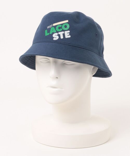 LACOSTE(ラコステ)の「【LACOSTE】プリントロゴ バケットハット L7105(ハット・メンズ・ネイビー・FREE)」の1枚目の写真