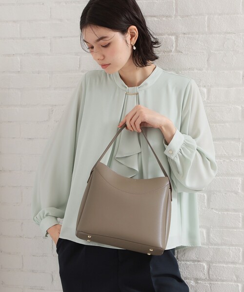 THE SHOP TK （ザ ショップ ティーケー ）の「ロゴベルトレザー調ミドルバッグ（ハンドバッグ・レディース・ブラウン系その他/ブラック/アイボリー・00）」の3枚目の写真