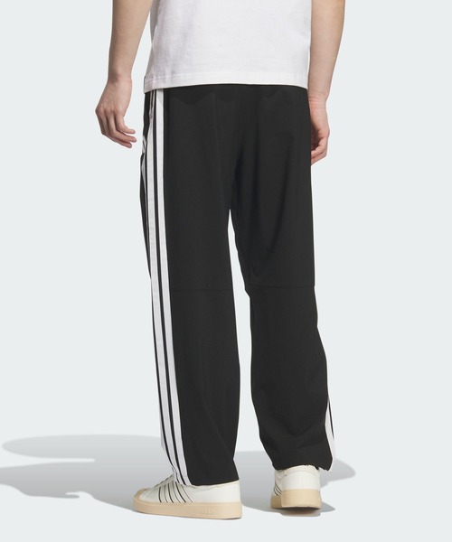 adidas(アディダス)の「ストレッチ ツイル ルーズフィット テーパードレッグ 10分丈 オープンヘム パンツ / アディダス adidas(その他パンツ・メンズ・ブラック×ホワイト・XX-LARGE/3XL/LARGE/MEDIUM/SMALL/X-LARGE/X-SMALL)」の2枚目の写真
