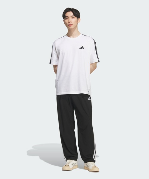 adidas(アディダス)の「ストレッチ ツイル ルーズフィット テーパードレッグ 10分丈 オープンヘム パンツ / アディダス adidas(その他パンツ・メンズ・ブラック×ホワイト・XX-LARGE/3XL/LARGE/MEDIUM/SMALL/X-LARGE/X-SMALL)」の3枚目の写真