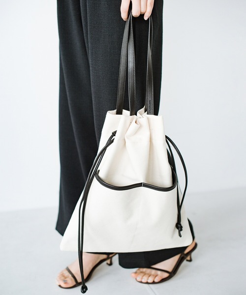 haco!(ハコ)の「【jou jou lier】キャンバス×合皮巾着トートバッグ(トートバッグ・レディース・ブラック/グリーン・ONE SIZE)」の1枚目の写真