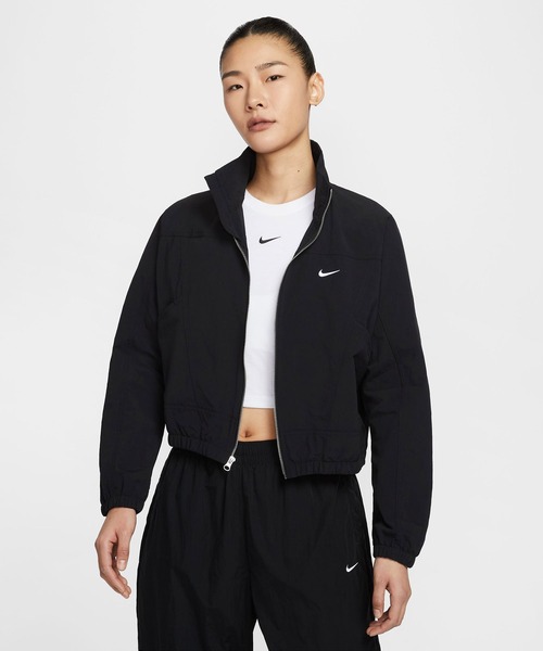 NIKE(ナイキ)の「NIKE AS W NSW EVRTHNG WVN RPL UV / ナイキ ウィメンズ NSW エブリシング ウーウ゛ン RPL UV 【SP】(ナイロンジャケット・レディース・ブラック/ホワイト・M/L)」の1枚目の写真