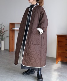 zena（ジェナ）の「ニュアンスアシメキルティングロングジャケット（ノーカラーコート）」