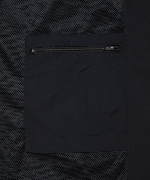 COOTIE PRODUCTIONS(クーティープロダクションズ)の「Nylon Paneling Track Jacket(ブルゾン・メンズ・ブラック/ネイビー・MEDIUM/X-LARGE/LARGE/SMALL)」の11枚目の写真