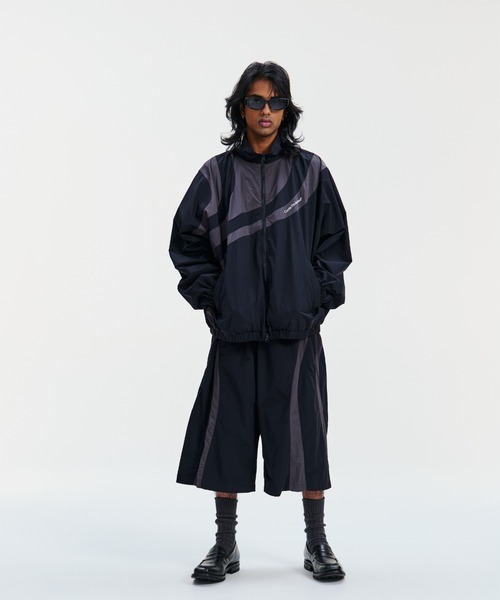 COOTIE PRODUCTIONS(クーティープロダクションズ)の「Nylon Paneling Track Jacket(ブルゾン・メンズ・ブラック/ネイビー・MEDIUM/X-LARGE/LARGE/SMALL)」の3枚目の写真