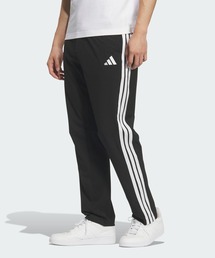 ストレッチ ツイル レギュラーフィット テーパードレッグ 10分丈 オープンヘム パンツ / アディダス adidas