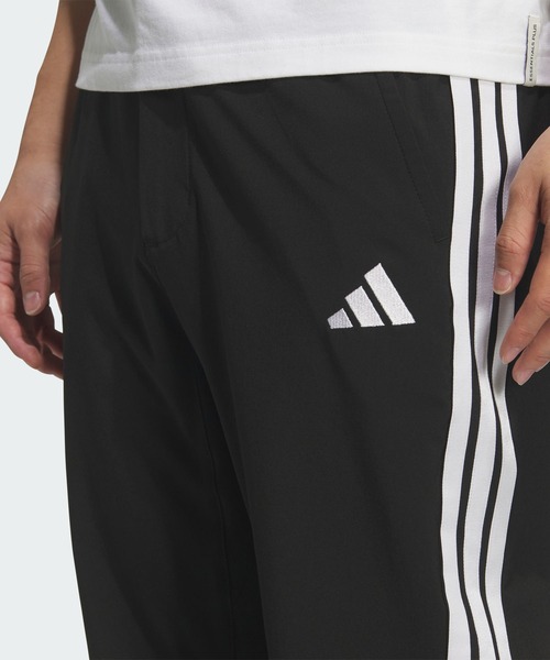adidas(アディダス)の「ストレッチ ツイル レギュラーフィット テーパードレッグ 10分丈 オープンヘム パンツ / アディダス adidas(スウェットパンツ・メンズ・ブラック×ホワイト・XX-LARGE/3XL/LARGE/MEDIUM/SMALL/X-LARGE/X-SMALL)」の4枚目の写真