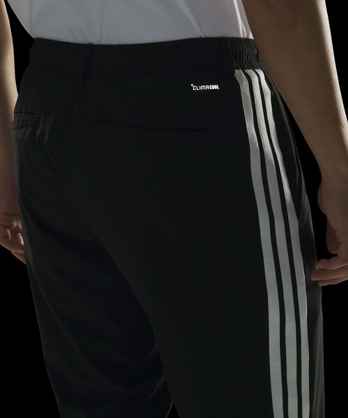 adidas(アディダス)の「ストレッチ ツイル レギュラーフィット テーパードレッグ 10分丈 オープンヘム パンツ / アディダス adidas(スウェットパンツ・メンズ・ブラック×ホワイト・XX-LARGE/3XL/LARGE/MEDIUM/SMALL/X-LARGE/X-SMALL)」の5枚目の写真