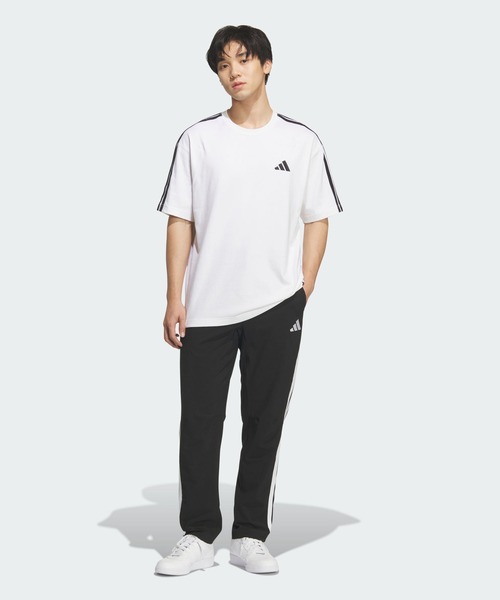 adidas(アディダス)の「ストレッチ ツイル レギュラーフィット テーパードレッグ 10分丈 オープンヘム パンツ / アディダス adidas(スウェットパンツ・メンズ・ブラック×ホワイト・XX-LARGE/3XL/LARGE/MEDIUM/SMALL/X-LARGE/X-SMALL)」の3枚目の写真