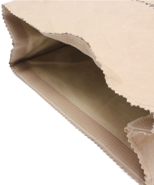 bpr BEAMS（ビーピーアール ビームス ）の「MATATABI /  Bagon the road ペーパーバッグ（クラッチバッグ・メンズ・ホワイト/その他1・ONE SIZE）」の6枚目の写真