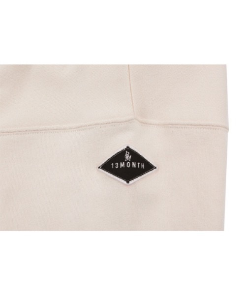 13MONTH（サーティーンマンス）の「【13month 】ロゴワッペン　クロップフーディ（パーカー・レディース・アイボリー/ネイビー・MEDIUM/LARGE）」の18枚目の写真