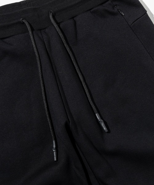 +phenix(プラスフェニックス)の「【WEB・直営店限定】+phenix(プラスフェニックス)HEAVY DUTY JOGGER SWEATPANTS ヘビー デューティー ジョガー スウェットパンツ(保温性/耐久性)(スウェットパンツ・メンズ・グレー/ブラック/ベージュ・M/XL/L/S)」の12枚目の写真