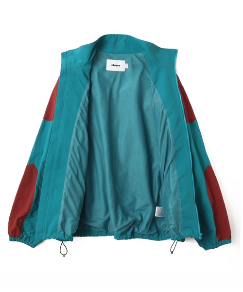 atmos（アトモス）の「atmos Bicolor Truck Jacket / アトモス バイカラー トラック ジャケット（ナイロンジャケット・メンズ・ベージュ/ブルー・M/L/XL）」の4枚目の写真
