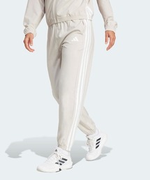 トレイン エッセンシャルズ スリーストライプス ウーブンパンツ / アディダス adidas