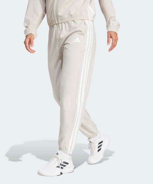 adidas(アディダス)の「トレイン エッセンシャルズ スリーストライプス ウーブンパンツ / アディダス adidas(その他パンツ・レディース・ホワイト・XX-LARGE/LARGE/MEDIUM/SMALL/X-LARGE)」の1枚目の写真