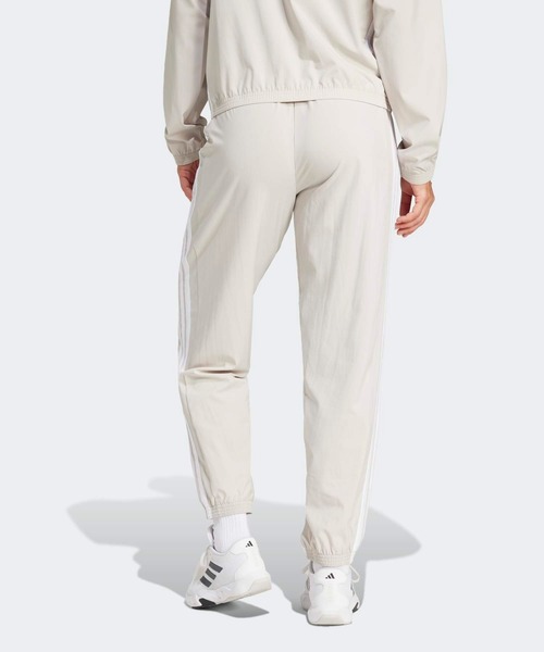 adidas(アディダス)の「トレイン エッセンシャルズ スリーストライプス ウーブンパンツ / アディダス adidas(その他パンツ・レディース・ホワイト・XX-LARGE/LARGE/MEDIUM/SMALL/X-LARGE)」の2枚目の写真