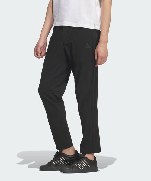 adidas(アディダス)の「ストレッチ ツイル レギュラーフィット テーパードレッグ 10分丈 オープンヘム パンツ / アディダス adidas(スウェットパンツ・メンズ・ブラック×ブラック・XX-LARGE/3XL/LARGE/MEDIUM/SMALL/X-LARGE)」の1枚目の写真
