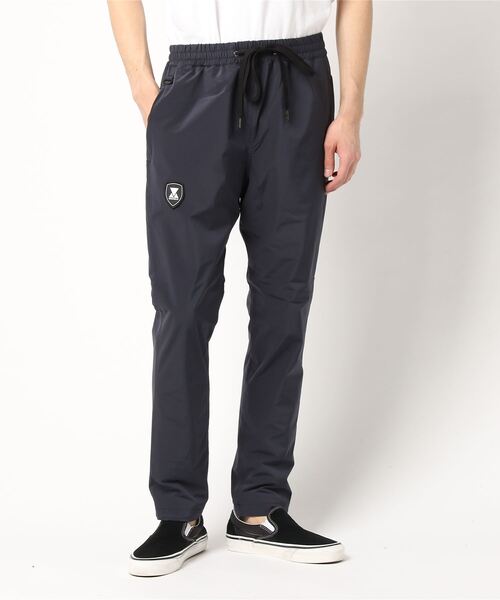 MAKAVELIC（マキャベリック）の「EMBLEM NYLON PANTS/ナイロンパンツ（その他パンツ・メンズ・ブラック/ネイビー・MEDIUM/LARGE/X-LARGE）」の2枚目の写真