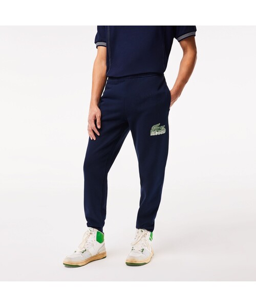 LACOSTE(ラコステ)の「ニューグラフィックプリントスウェットトラックパンツ(その他パンツ・メンズ・ネイビー・3/4/2/5)」の1枚目の写真