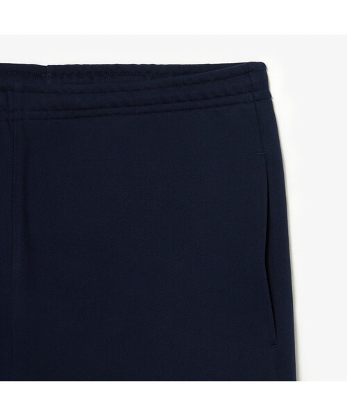 LACOSTE(ラコステ)の「ニューグラフィックプリントスウェットトラックパンツ(その他パンツ・メンズ・ネイビー・3/4/2/5)」の5枚目の写真