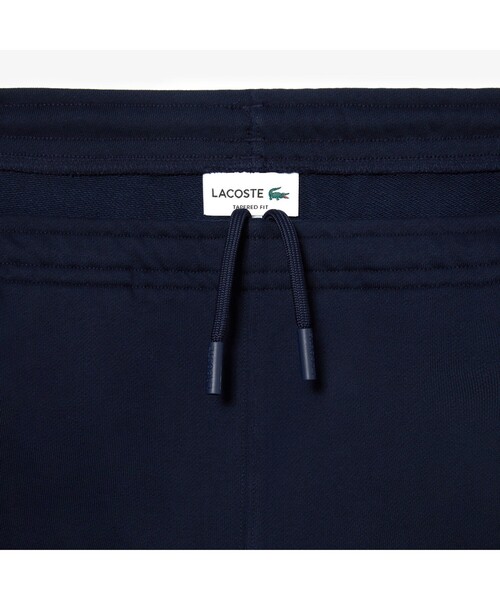 LACOSTE(ラコステ)の「ニューグラフィックプリントスウェットトラックパンツ(その他パンツ・メンズ・ネイビー・3/4/2/5)」の6枚目の写真