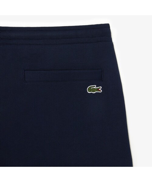 LACOSTE(ラコステ)の「ニューグラフィックプリントスウェットトラックパンツ(その他パンツ・メンズ・ネイビー・3/4/2/5)」の7枚目の写真