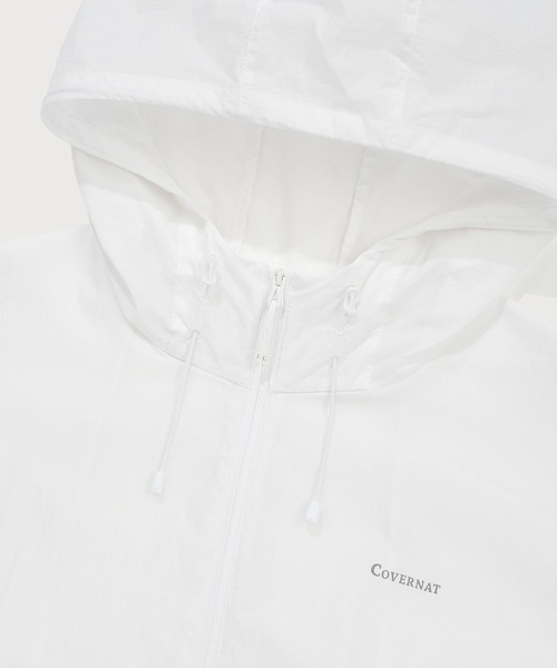 COVERNAT（カバーナット）の「WOMEN PACKABLE LIGHTWEIGHT WINDBREAKER JACKET（ナイロンジャケット・レディース・スカイブルー/ダークネイビー/ホワイト・SMALL/MEDIUM）」の11枚目の写真