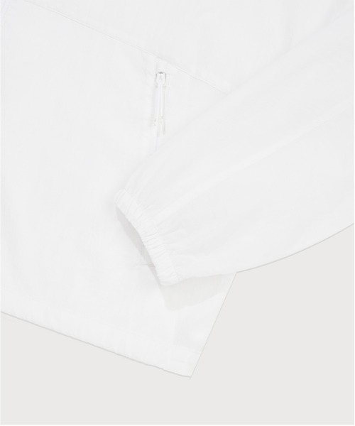 COVERNAT（カバーナット）の「WOMEN PACKABLE LIGHTWEIGHT WINDBREAKER JACKET（ナイロンジャケット・レディース・スカイブルー/ダークネイビー/ホワイト・SMALL/MEDIUM）」の13枚目の写真