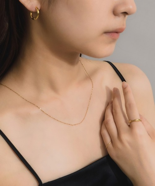 muku(ムク)の「金属アレルギー対応 ツイストウェーブリング/サージカルステンレス/316L(リング・レディース・ゴールド/シルバー・11/13/3/9)」の3枚目の写真